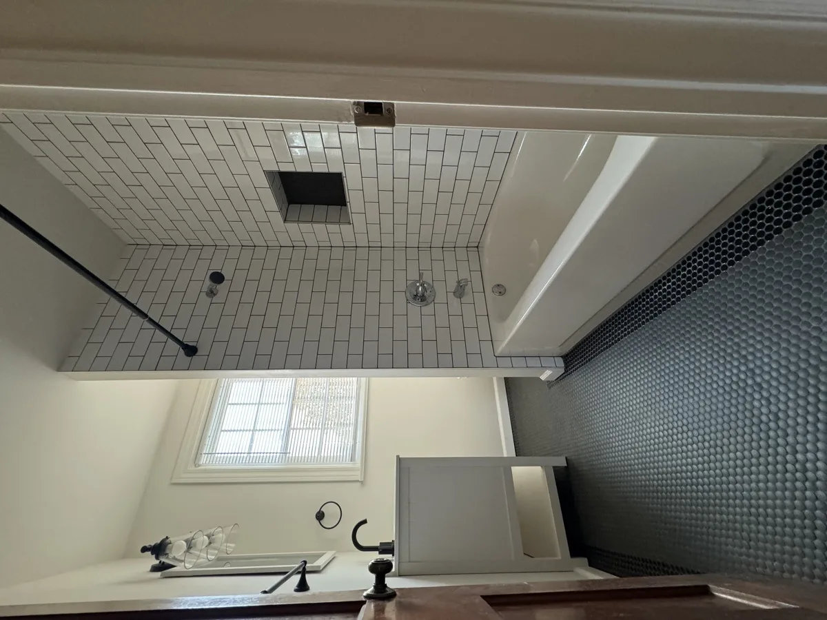 Remodeled bathroom with subway tile