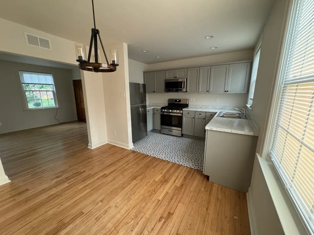 Remodeled kitchen interior in a McGennis Group rental